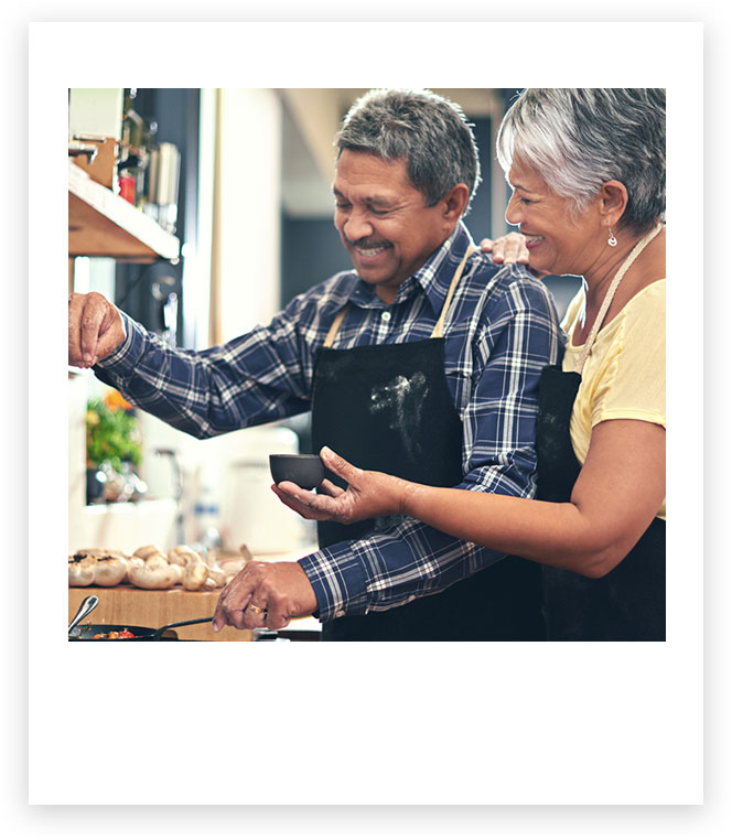 Man and woman cooking together