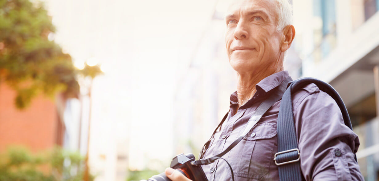 Man with camera around his neck